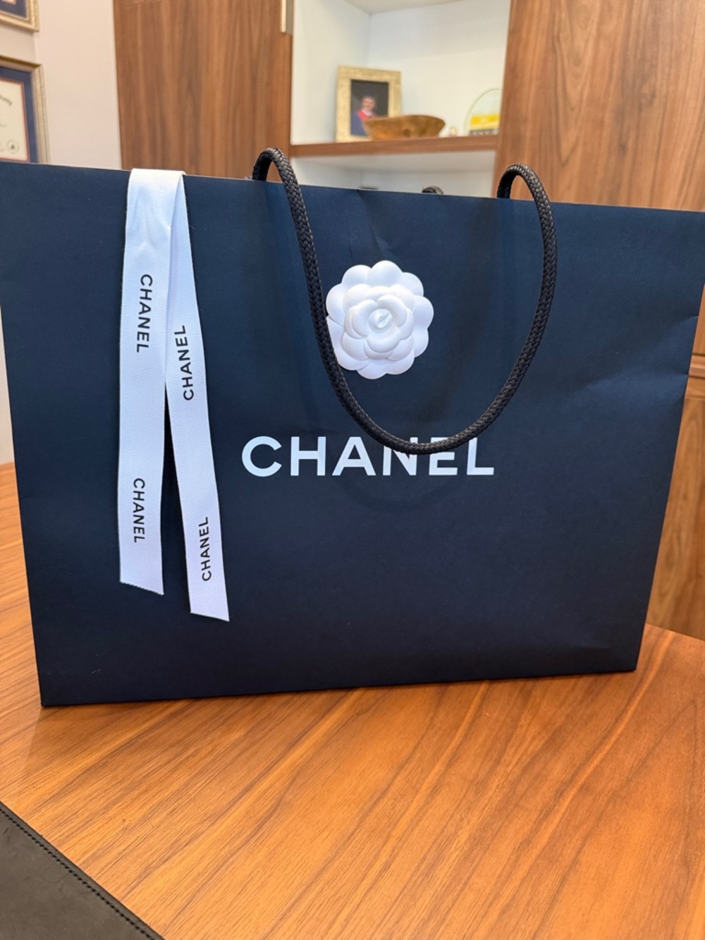 CHANEL Black Shopping Bag with White Camellia Accent and Ribbon 16.75”x13”x6.25”